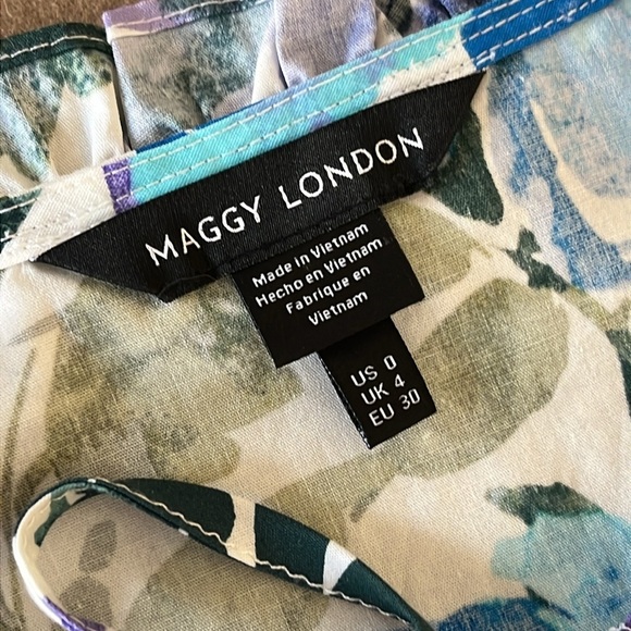 MAGGY LONDON POPLIN TRAPEZE W/TIE NECK DRESS KAYLA IN FLOWER
WORK - NWOT Size 0 - Picture 7 of 10